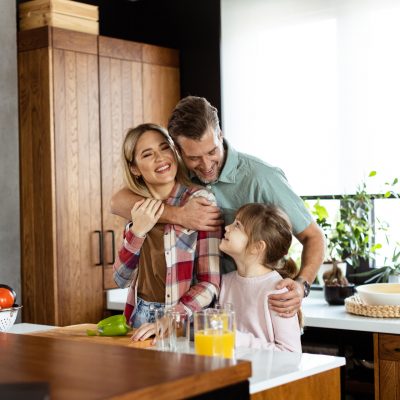 A happy family in their pest-free kitchen.